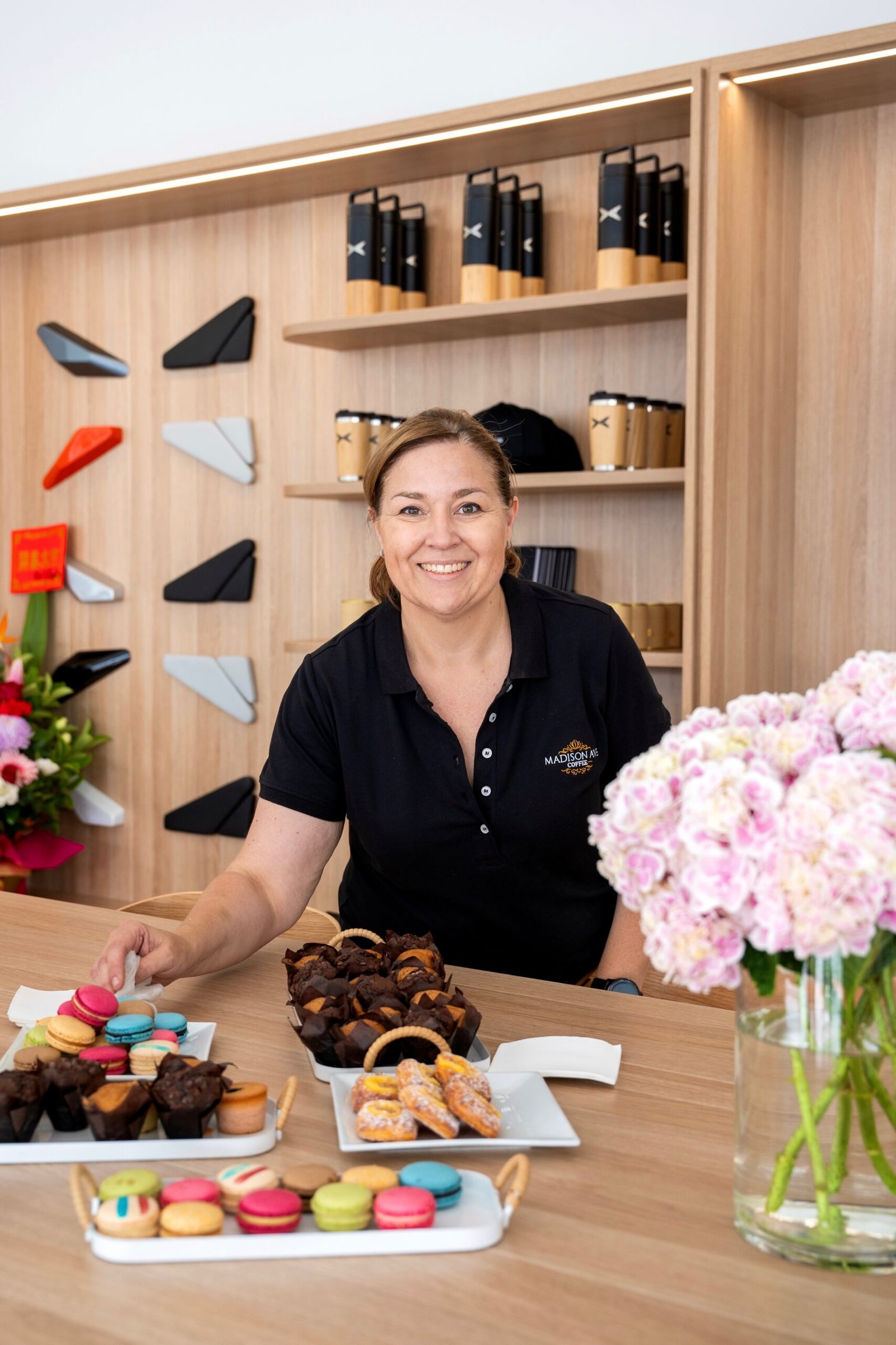 Barista with pastries and coffee